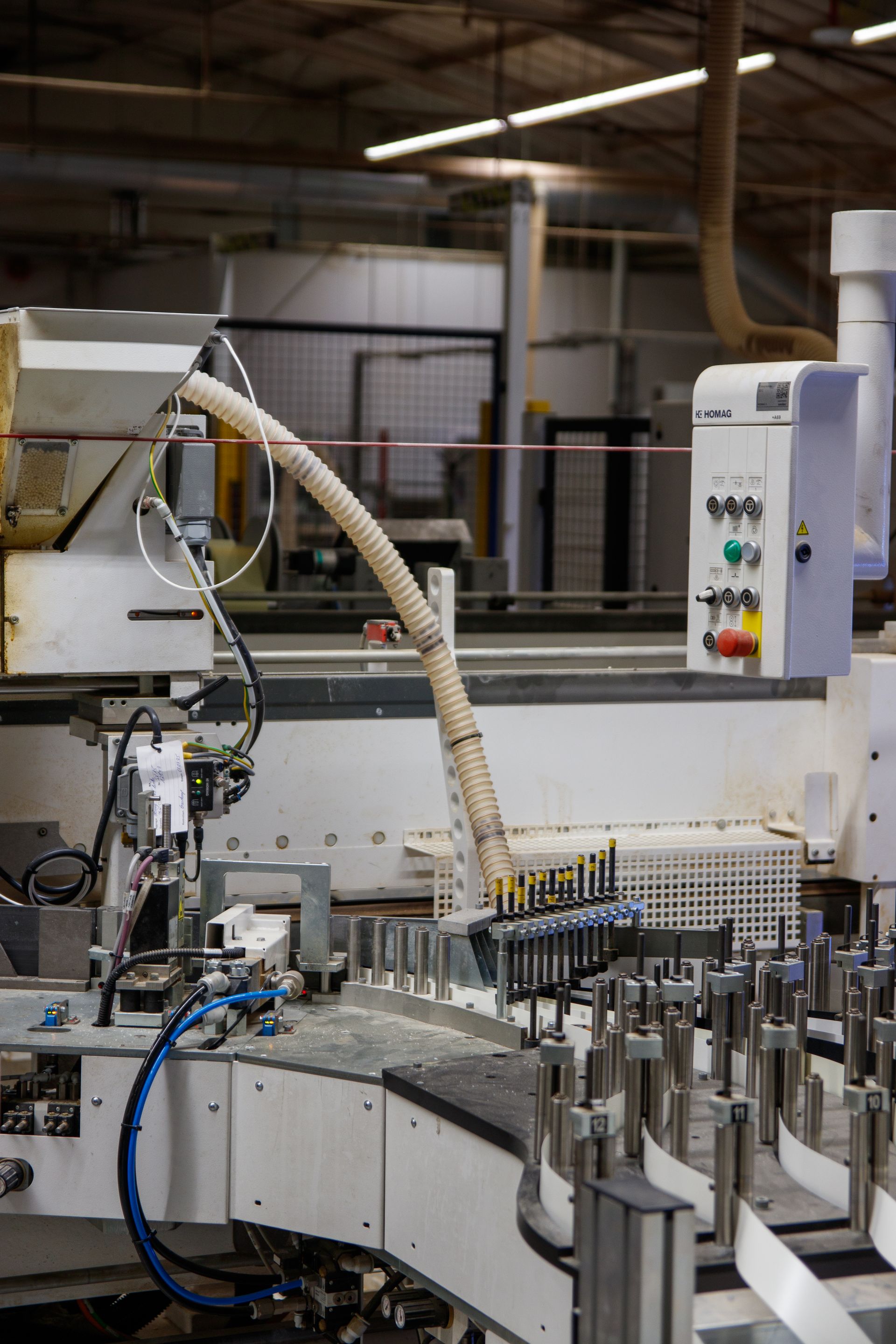 Automated manufacturing equipment on a factory production line